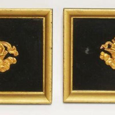 1099	EMBOSSED GILT METAL GREEK MYTHICAL FIGURES IN HORSE DRAWN CHARIOTS MOUNTED IN FRAMES, EACH APPROXIMATELY 8 IN X 12 IN OVERALL
