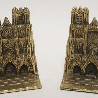 1051	CAST METAL BOOKENDS DEPICTING A CATHEDRAL IN GILT FINISH, APPROXIMATELY 5 1/4 IN HIGH
