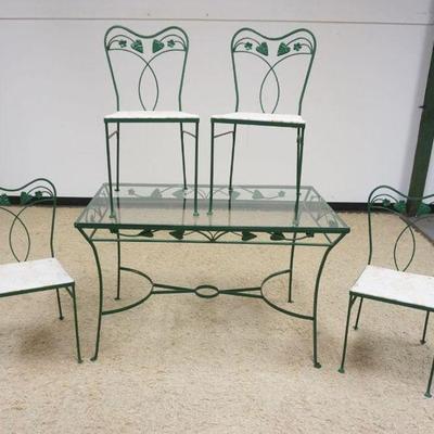 1158	WROUGHT IRON PATIO/SUN ROOM TABLE W/GLASS TOP & 4 CHAIRS, TABLE APPROXIMATELY 48 IN X 29 IN X 30 IN HIGH
