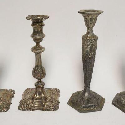 1061	2 PAIRS OF CANDLESTICK SETS, ONE SILVERPLATE & OTHER CAST METAL W/EMBOSSED IMAGES OF PEOPLE, TALLEST APPROXIMATELY 10 IN
