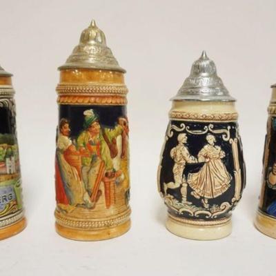 1195	GROUP OF 4 VINTAGE GERMAN STEINS W/PEWTER LIDS, TALLEST APPROXIMATELY 10 IN

