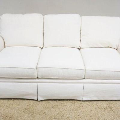 1159	BASSET IVORY UPHOLSTERED SOFA, APPROXIMATELY 80 IN X 38 IN X 30 IN HIGH
