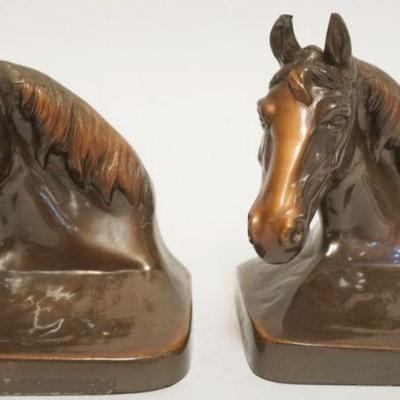 1048	PAIR OF CAST METAL HORSE HEAD BOOKENDS IN BRONZE FINISH, EACH APPROXIMATELY 4 X 4 1/2 IN X 5 IN HIGH
