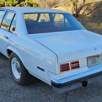 1976 Chevy Nova - Concours Model - 4 Door - Small Block 400hp Engine - White - Red Interior. Runs Great !