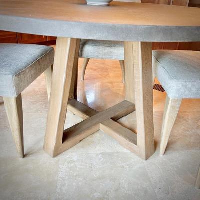 Round breakfast table and four upholstered chairs