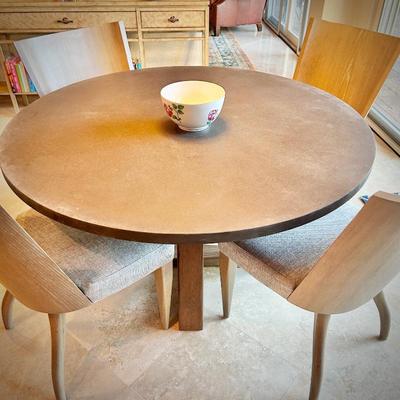 Round breakfast table and four upholstered chairs