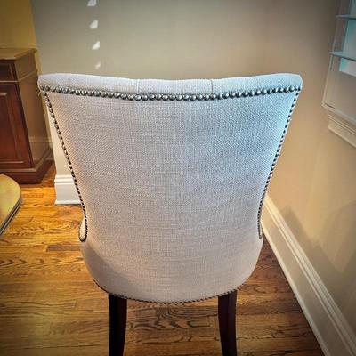 Six dove gray upholstered dining chairs