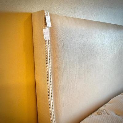 Stearns & Foster upholstered king bed with nailhead trim, and Stearns & Foster king mattress and box spring