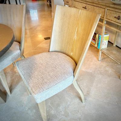 Round breakfast table and four upholstered chairs