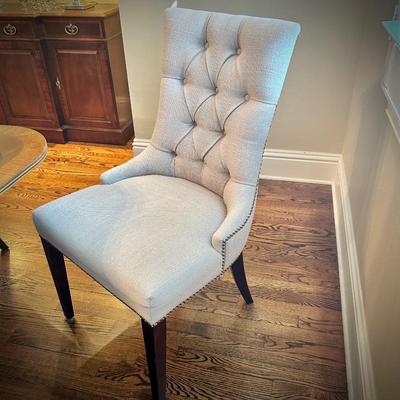 Six dove gray upholstered dining chairs