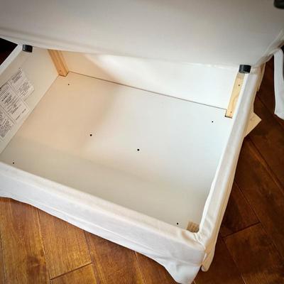 Pottery Barn off-white slip-covered armchair and storage ottomanottoman