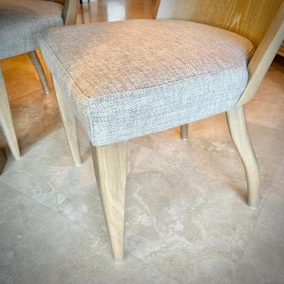 Round breakfast table and four upholstered chairs