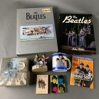 Lot 74 | Beatles Books, Puzzle, Statue Collectors Lot
