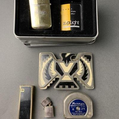 Lot 12 | Zippo Lighter, Mustang, Measuring Tape, & More
