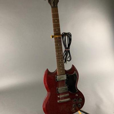 Lot 50 | Austin Ruby Red Wood Grain Electric Guitar W Stand
