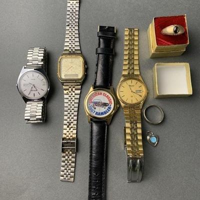 Lot 8 | Watches, Locket, and Costume Jewelry Rings
