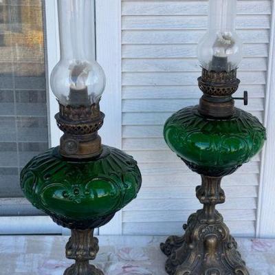 (2) Green Glass Oil Lamps
