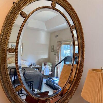 Antique oval giltwood mirror