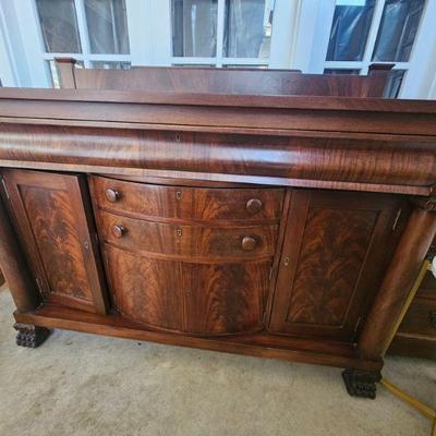 Antique Empire crotch mahogany sideboard
