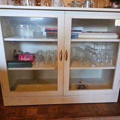 Glass front cabinet and drinking glasses