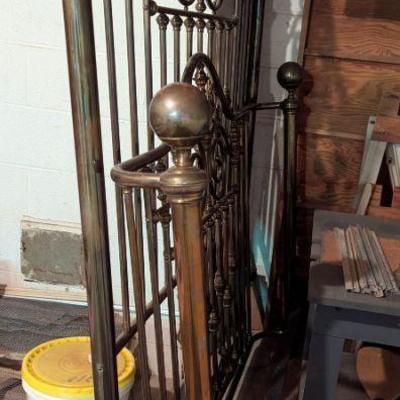 Queen-sized brass bed