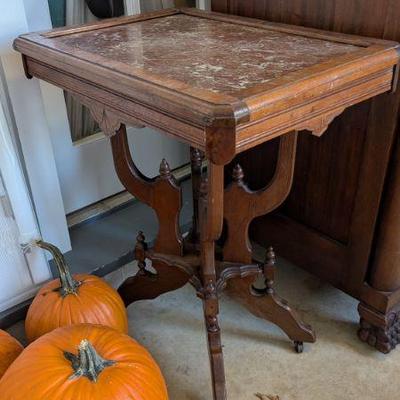 Antique parlor table with marble top