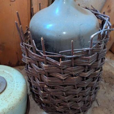 Vintage 5 gal bottle in wicker