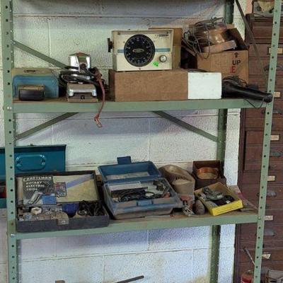 Metal shelving with assorted tools
