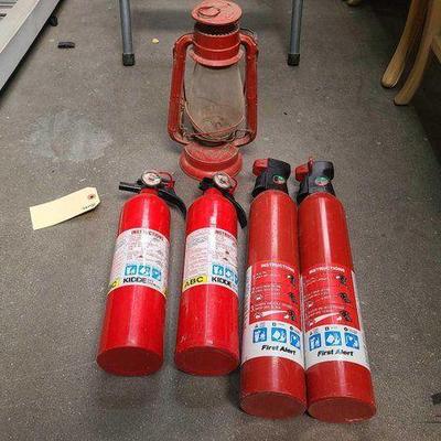 #2534 • (4) Fire Extinguishers and (1) Winged Wheel No 500 Kerosene Lantern
