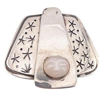 Lot 162   
Man In The Moon Carved Moonstone Brooch