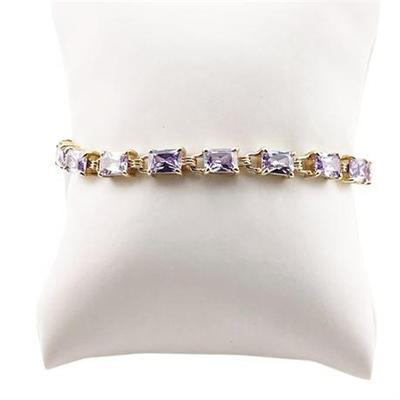 Lot 142   
Amethyst and 14 K Yellow Gold Bracelet