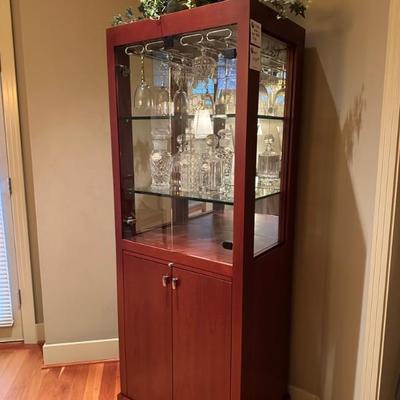 Custom Bar cabinet with glass shelves, wine glass holders, pull out drawer to make drinks - custom quality