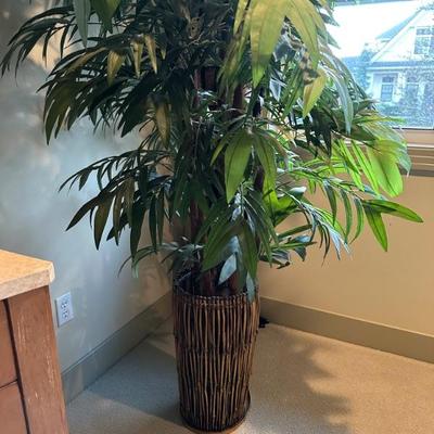 Variety of faux plants around the house