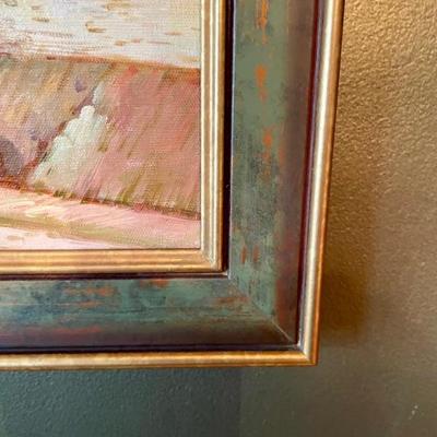 Many pictures and paintings throughout the home all masterfully framed