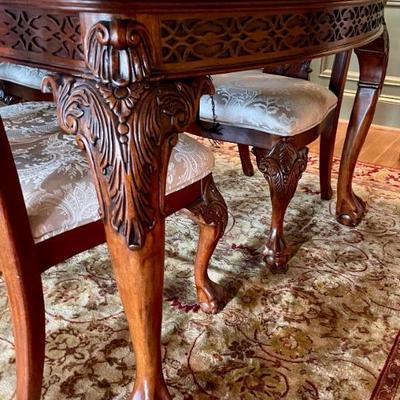 Unusual Table and 8 chairs carved not only on the front but also on the back of the chairs so that you can enjoy them from across the...