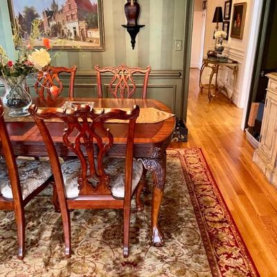 Unusual Table and 8 chairs carved not only on the front but also on the back of the chairs so that you can enjoy them from across the...