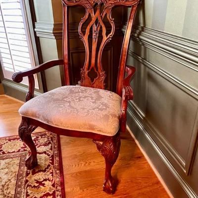 Unusual Table and 8 chairs carved not only on the front but also on the back of the chairs so that you can enjoy them from across the...