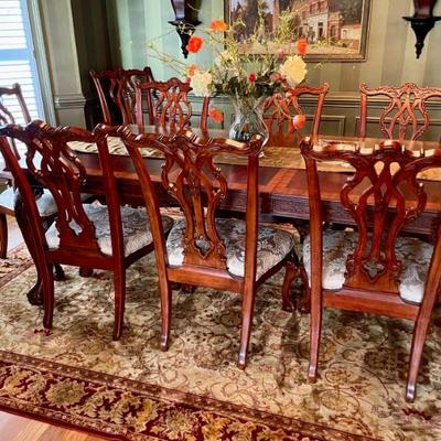 Unusual Table and 8 chairs carved not only on the front but also on the back of the chairs so that you can enjoy them from across the...