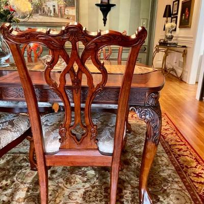 Unusual Table and 8 chairs carved not only on the front but also on the back of the chairs so that you can enjoy them from across the...