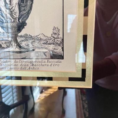 A lot of great framed pictures, architectural, historical themes