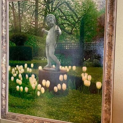 Many pictures and paintings throughout the home all masterfully framed