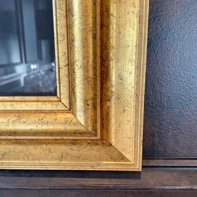 A lot of great framed pictures, architectural, historical themes