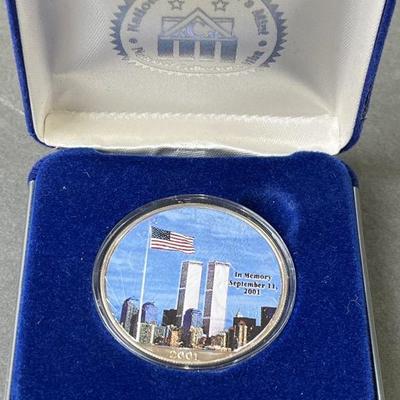 Lot 162 | Silver Walking Liberty 9/11 Memorial Coin
