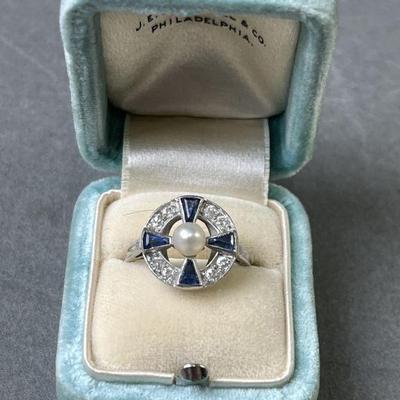 Lot 181 | 1920s Platinum Diamond, Sapphire & Pearl Ring
