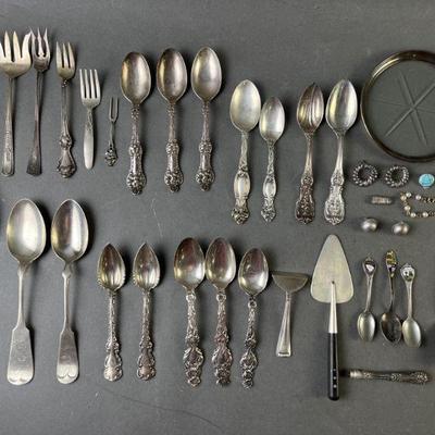 Lot 127 | Sterling Silver Flatware Jewelry & Coaster & More
