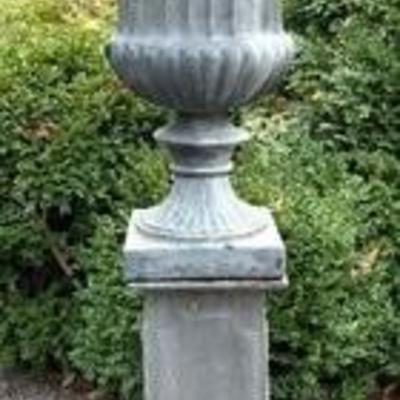 Outdoor Planter with Pillar 

Measures 53 inches tall. 

Light wear consistent with bring displayed outdoors.