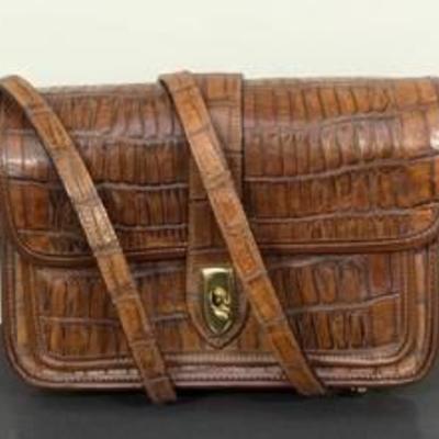 Dooney and Bourke Brown Crocodile Print Leather Purse / Handbag 

Appears to be in very good  condition. 

Measures 9.5” wide and 7” high.