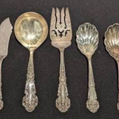 Reed and Barton French Renaissance Sterling Silver Serving Utensils.

The large fork measures 7.5” long. The total weight is 278 grams.