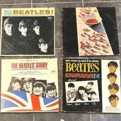 Four Record Albums by The Beatles and Paul McCartney 

Including Meet the Beatles, The Beatles Story, McCartney and more.