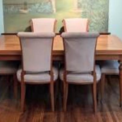Elegant Vintage Dining Room Set.

The table appears to have a light cherry finish and is great condition. The chairs fabric have some...